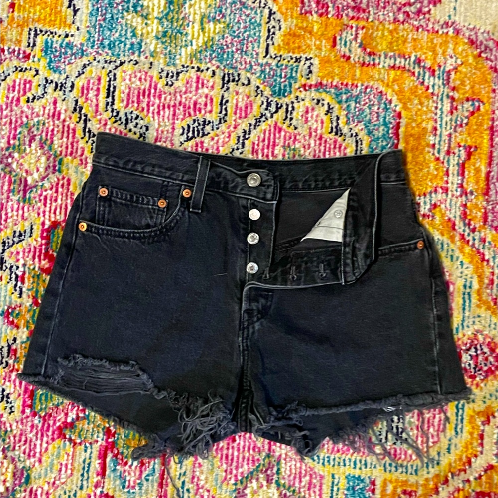 LEVI’S high rise washed black denim cut off shorts